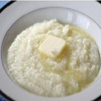 Grits are a fundamental Southern food and most people have never tried them. This recipe uses milk which makes the grit's a bit thicker and creamier....