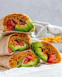 These Sweet Potato Burritos are loaded with flavor and are so easy to make! They're packed with nutrients and ready in just 30 quick minutes! Enjoy! #plantbasedonabudget #sweet #potato #burritos 