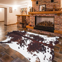 Enhance your modern western bedroom with this 5.2x4.6-foot faux cowhide rug. Perfect for living rooms, dining rooms, and more. #RusticChic #CowhideRug #WesternDecor