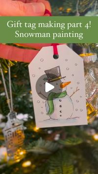 Danielle Hooi on Instagram: "Join me for part 4 of gift tag making and today we are painting this adorable snowman! ☃️ 

1. using your pencil, lightly draw a small circle as the head, then underneath draw a bigger circle as the body. This is just an outline so it doesn’t need to be perfect.
2. Next draw the hat – draw a straight line across the top of the head and a square shape on top. Next draw the carrot nose, eyes, smile, scarf and buttons.
3. We’ll then paint the hat using black, outline the scarf using your colour of choice and fill in, and brown for the stick arms. Use orange to colour the nose and leave a little white line for a shiny nose!
 4. Then use a light blue to outline and shade some of the snow around the body and under the scarf. 
5. Next go over your pencil outlines with