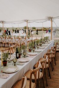 Marquee wedding reception with green coloured glassware with mini terracotta pots of rosemary for Italian inspired wedding | classic wedding | traditional wedding | green wedding colour scheme | Alice Cunliffe Photography