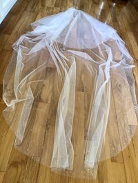 This two tier bridal veil will glimmer in the most elegant way for your walk down the aisle. Click through to request free color samples for your custom beaded wedding veil #weddingveil #entrepreneur