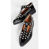 Marc Jacobs Studded Mary Jane Leather Flats. Retails $425.00. Size 37. Color Black. Genuine Patent Leather Upper. Silver Tone Studs. Adjustable Buckle Straps. Leather Lining. Rubber Sole. 1.5” Heel. Imported. Accompanied By Box And Dust Bag.