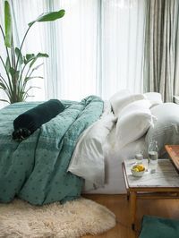 Ines Duvet Cover in Jade, Loulah Bolster in Jade, Linen Duvet Cover in Eucalyptus, Linen Fitted Sheet in Winter White, Linen Shams in Winter White, Linen Pillowcases in Eucalyptus, Helane Lumbar Pillow in Jade