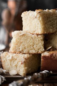 High altitude almond coffee cake, filled with a layer of cream cheese and almond paste, and sprinkled with almond crumble topping. This is a moist and fluffy coffee cake, made with butter and sour cream, and lightly spiced with cardamom. Perfect for the holidays!