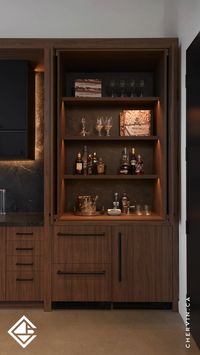 Open for a quick beverage or closed for a sleek, discreet look—these walnut pocket doors in this Modern Industrial executive lounge elevate the space while keeping everything neat and tidy.
.
.
Interior Design by: @bauditdesign
Construction: @skygridconstructioninc
Photographed by: @kim.jeffery.photographer
.
.
.
#ChervinKitchen #CustomCabinetry #CustomMillwork #OfficeDesign #CommercialDesign #CommercialSpace #CommercialInteriors #WalnutCabinets #WalnutPocketDoors #MoodyPalette #IndustrialStyle #ModernCabinets #ModernKitchen #LuxuryKitchen #LuxuryInteriors #LuxuryDesign #InteriorDesign #ExecutiveLounge #MoodyKitchen #KitchenDesign #WalnutKitchen #KitchenOrganization #KitchenStorage #KitchenCabinets #KitchenIdeas #KitchenInspiration #KitchenInspo #PocketDoor #PocketDoors #ProjectAIM