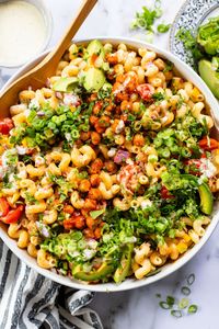 This Buffalo Chickpea Pasta Salad is the ultimate vegan salad! Made with crispy buffalo chickpeas, dairy-free green chile ranch & veggies!