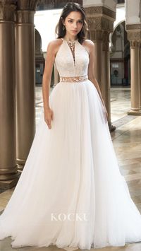 Introducing our elegant Halter Neck A-Line Beach Wedding Dress! Made with delicate lace and stunning appliques, this gown creates a bohemian vibe perfect for your special day. The halter neck and A-line cut flatters the figure while the sleeveless design provides a comfortable and breezy feel. Say "I do" in style with this beautiful dress.