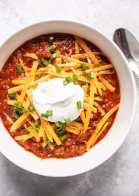 Chili, without the beans—just beef, tomatoes, onions, and lots of great spices. Make it ahead, freeze the leftovers, and eat it for days.