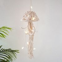 PRICES MAY VARY. HANDMADE JELLYFISH : The jellyfish macrame wall hanging are made of 100% natural cotton rope. It was woven by craftsmen for many years, real like delicate in details. A perfect handmade wall ocean decor. Size: 55 x 20 cm / 21.7 x 7.9 in. UNIQUE WALL DECOR: Unique design, jellyfish after hours of knotting, meticulously handcrafted, using materials giving a minimalist feel and creating a relaxed feel in the room. Also perfect for theme room decor or seaside hotel / office / studio