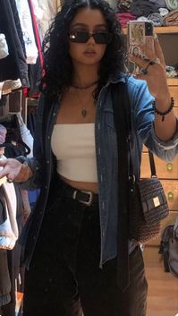 Denim shirt white top black pants with belt and some glasses