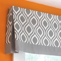 Learn how to make a no sew valance that has pleats at the corners and an accent band at the bottom. This simple design will go with many décor styles.