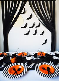 Amp up the Halloween vibe at your house with this Halloween tablescape! Have a party or just use it as decoration you don't have to store for next year, either way you won't want to miss this September Deal of the Month! Halloween | Decorations | Spiders | Bats | Party Kit | Halloween Party | Halloween crafts | Halloween ideas