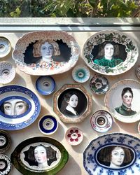 A portrait of a lady on a vintage English Johnson Bros. Staffordshire platter with a border of ivy; 12"x9.75".