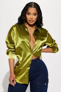 Buy Tell Me Later Satin Shirt in Olive from Fashion Nova. These Shirts & Blouses are available in most sizes. Receive free US shipping on orders over $75.