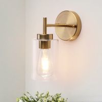 The wall sconce lighting in gold is a modern spin on the original, offering a Retro appearance in a classic hue. The fixture embodies a practical, yet beautiful design as an homage to the original concept. Finish: Gold | Breakwater Bay Alacam Dimmable Bath Sconce Wall Light w / Glass Shade in Yellow | 10.2 H x 7.4 W x 7.4 D in | Wayfair