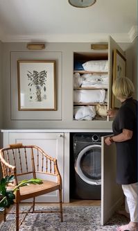 A nice little reading corner in the laundry, plus linen closet, and no one would ever be the wiser.