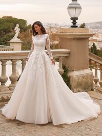 Princess wedding dress with boat neckline, long sleeves and transparent back