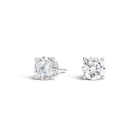 14K white gold round brilliant cut diamond stud earrings from the Reis-Nichols Collection. The earrings feature two round brilliant cut diamonds weighing 3.02 ctw. All our diamond stud earrings include diamonds of exceptional cut, color and clarity.