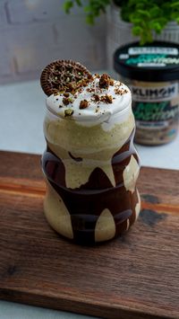 Must try this dairy-free Chocolate Mint Cookie Milkshake with a touch of mint cookies and coconut whipped cream. Using my favorite ice cream