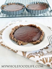 Salted Caramel Chocolate Tarts.  The perfect holiday dessert.  It's a cinch to make with only 6 ingredients and no refined sugar.  Vegan, gluten free and grain free.