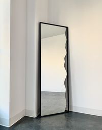 "This timeless, beautiful and heavy duty rectangular framed ameba blob mirror is 20\" x 60\". (CUSTOM SIZES AVAILABLE!) just email us and we will get you a quote This is framed in hand torched and welded steel to give it a modern and industrial look but it's still has a light and airy feel. Handcrafted in our Utah workshop, you can choose from black, white or raw steel. Each mirror is hand cut so there will be slight variations in the wavy pattern if you need a custom size please send us a messa