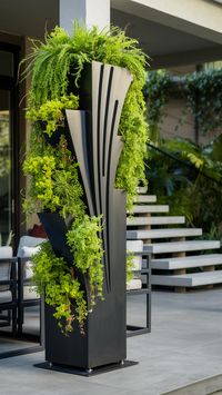 Upgrade your modern patio with our innovative tall outdoor planter ideas. Explore contemporary designs that complement any modern outdoor setting.