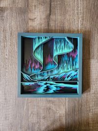 Calling all aurora chasers, this piece is for you! This northern lights/aurora borealis wall art is laser cut and made of 6 layers of wood. It is then painted (please contact for other color options beside what is shown) and assembled. Display this art in your house or gift it to a friend to be the best gift giver ever. As always, thank you for your support in my dream!