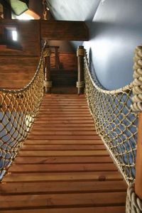 A nautical-themed rope bridge is a perfect accessory for a pirate-ship kid's room.