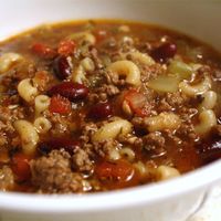 Ground beef, beef broth, lots of garlic, tomatoes, ditalini pasta and kidney beans are seasoned with thyme, basil, oregano and parsley in this traditional soup.