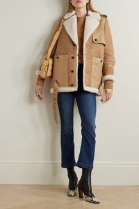 Shearling jackets are huge this season and FRAME's trench-inspired one is such a chic way to tap into the trend. It has a tonal leather storm flap and matching pockets and features the traditional shoulder epaulettes and belted hem.