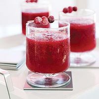 Who says margaritas are just for summer? Celebrate the holidays with this festive frozen drink featuring both cranberry juice cocktail and fresh cranberries. Reserve some of those fresh berries to make a simple garnish.