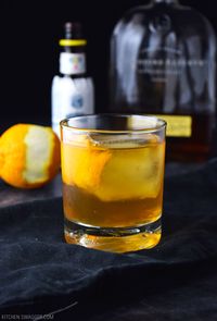 How to make the classic old fashioned cocktail the right way. Bourbon, bitters, simple syrup (sugar cube), and an orange peel.