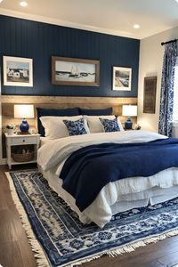 Rustic Charm: Blue and White Reclaimed Wood Bedroom  Cozy blue and white bedroom with reclaimed wood headboard. Vintage lamps and mixed textures offer a perfect blend of comfort and style. #RusticBedroom