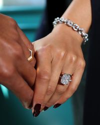 When it comes to a big gesture, the Elle knows how to deliver. With a cushion cut diamond on a double-prong setting framed by rows of pavé, its a masterpiece you'll wear forever. Shop unique solitaire lab diamond engagement rings at Jean Dousset.