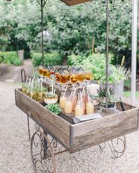 20 Bar Carts That'll Transform Your Wedding's Cocktail Hour and Reception #WeddingBars #WeddingBarCarts #BarCarts #WeddingDrinks | Martha Stewart Weddings