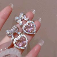 Brand New. Pet Free Smoke Free. Pink Heart Bow Diamond Earrings - Simulated Diamonds