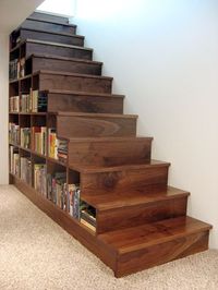 18 Useful Designs for Your Free Under Stair Storage #Under #Stair #Storage #DIY #DeadSpace #Staircase #Closets #Basement Take advantage of unused space under the basement stairs with these inexpensive (and DIY!) storage shelves.