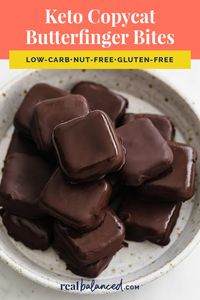 These Keto Copycat Butterfinger Bites are low-carb, nut-free, egg-free, gluten-free, grain-free, sugar-free, and coconut-free. They use a surprising ingredient, yet taste like the delicious candy bars you know and love! Made with monk fruit sweetener, they are perfectly sweetened and are still very low in net carbs. They can even be stored in the freezer to eat later right when a craving for something sweet and chocolatey strikes! #realbalancedblog #sponsored #ketodessert