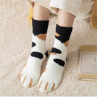 #ad These socks turn your feet into your own calico cat paws.