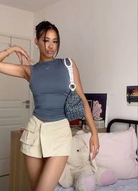 2023 Aesthetic Outfits, Summer Outfits, Trendy Outfits, Mini skirt, Cargo skirt, baddie, trendy, aesthetic, summer fits, summer, fits, outfits, black girl outfits, purse, neutral, stylish  https://instagram.com/raelsymora?igshid=NTc4MTIwNjQ2YQ==