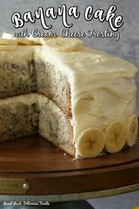 Banana Cake with Cream Cheese Frosting is a moist and delicious banana cake recipe frosted with a delicious cream cheese frosting. #bananacake #deliciousdessert #easybanancake #bananarecipe #greatgrubdelicioustreats