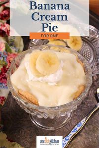 Homemade mini banana cream pie made with one banana, creamy vanilla pudding and a cookie crust. Deliciously rich single serving recipe.