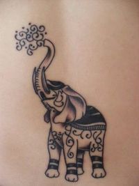 Elephant shape tattoo idea for women backside tattoo