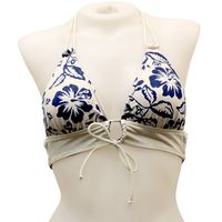 Introducing our stylish and versatile Reversible Keyhole Tie Front Bikini Top, specially designed for women who value both comfort and fashion. Made with the highest quality performance swimwear fabric, this bikini top is soft, durable, and perfect for any beach or pool adventure. The unique double spaghetti ties at the neck and back allow for an adjustable fit, ensuring that you feel secure and comfortable all day long. Featuring a banded chest design and a playful keyhole cutout in the front,