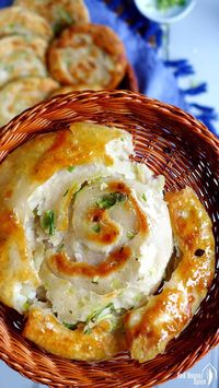 An informative guide to making scallion pancakes (Cong You Bing, 葱油饼). This recipe shows you how to make them flaky, tasty and crispy. Dipping sauce suggestions are also provided.