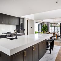 Radiating romance and elegance, Webb & Brown-Neaves' French modern kitchen design pairs a cantilevered island with 112mm thick Organic White™ benchtop with panelled charcoal cabinetry, brass touches and Chevron timber floors to create this stylish look. 

Home Builder: Webb and Brown Neaves (WA)
Kitchen Design & Build: The Maker Designer Kitchens
Benchtops & Splashback: Caesarstone® Organic White™
Cabinetry Handles: Bronte, Hepburn Hardware
Photography: Dmax Photography

#kitchendesign 