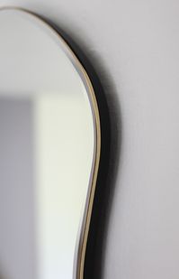 Featuring two individual mirrors, the Pond series explores organic shapes for a classic mirror with a metal frame. Inspired by free-flowing movements of water, the mirror invites open and fluid forms into your home, turning the functional mirror into a decorative wall piece. The mirror can be hung more ways so that you can find the perfect fit for the room and your needs.