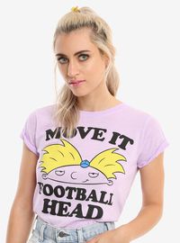 Fitted lavender enzyme wash tee from Hey Arnold! featuring an Arnold character design on the front with text that reads "Move It Football Head." 100% cotton Wash cold; dry low Imported Listed in junior sizes