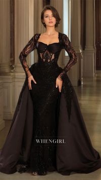 Expertly designed with long sleeves and a sweetheart neckline, this party prom dress boasts intricate appliques and sparkly lace for a show-stopping look. The sheath silhouette hugs your curves, while the overskirt adds a touch of whimsy. Perfect for any special occasion, this dress is both elegant and eye-catching.